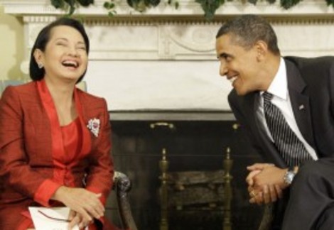 President Obama laughing with Philippine President Arroyo